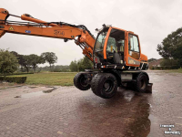 Pelleteuse Liebherr 314