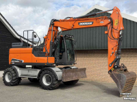 Pelles sur pneus Doosan DX140w-5