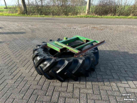 Pousse fourrage à pneu Holaras Voerband  voerrolveger