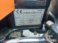 Pelles sur pneus Hitachi ZX 10U