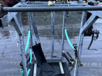 Etable à barre de garrot  Klauwbekapbox