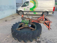 Pousse fourrage à pneu  Voerbandveger hydraulisch aangedreven