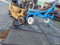 Arracheuse des mottes Robot zij schudlichter  / zij rooier