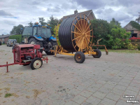 Moteur / Pompe stationair Emergo Haspel met Nelson sproeier en MwM motorpomp