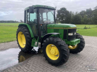 Tracteur John Deere 6100 MFWD PowerQuad 24-speed